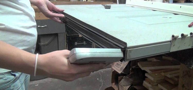 damaged steel door repair Hunters Creek