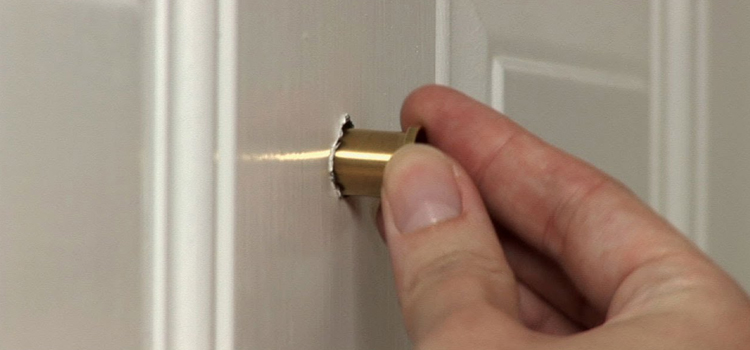 peephole door repair in Hunters Creek